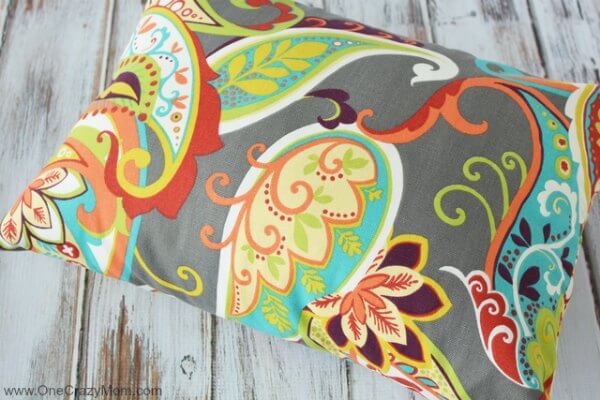 This easy Envelope Pillow Cover one piece is so easy to make! With step my step instructions you can make these easy DIY pillow covers in 30 minutes! Learn how to make a pillow cover. How to make an envelope pillow cover is easy. 