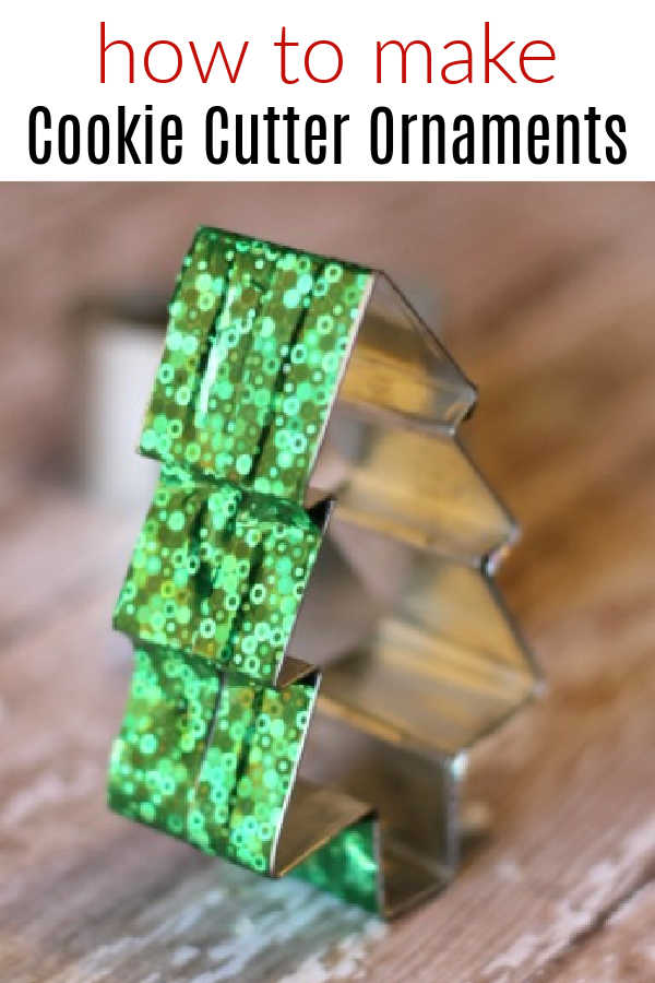 Homemade cookie cutter ornament decorated as a Christmas tree.