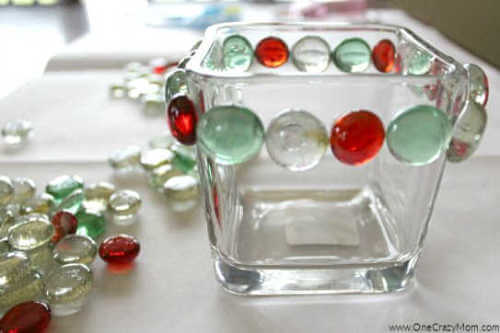 Looking to jazz up your holiday decor on a budget? Try this DIY Dollar Store Christmas Candle Holder that takes only minutes to make and is frugal and easy. 