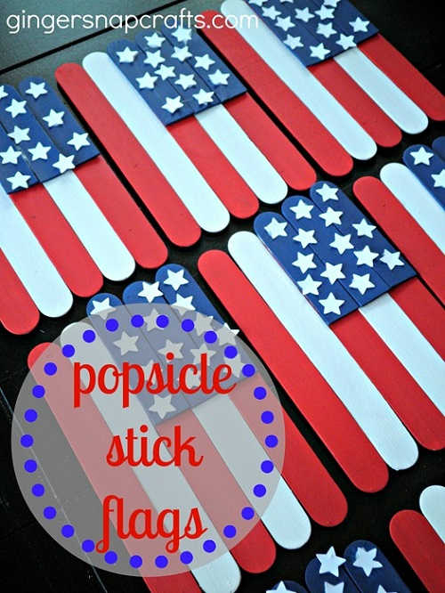 Popsicle stick flags on table. 