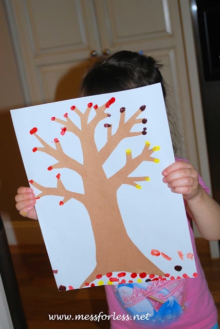 Fall tree with fingerprint leaves. 