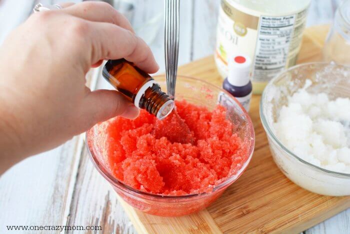 Red food coloring being added to mixture. 
