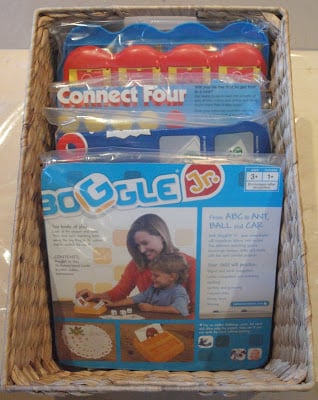 Board games in a basket. 