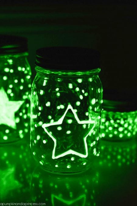 Glow in the dark mason jars lit up.