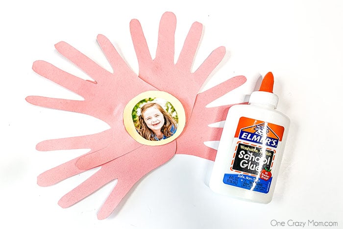 Handprint Flowers are perfect to make for Mother's Day, birthdays and more. This gift will be cherished for years to come by Mom, Grandma and others.
