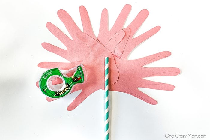 Handprint Flowers are perfect to make for Mother's Day, birthdays and more. This gift will be cherished for years to come by Mom, Grandma and others.