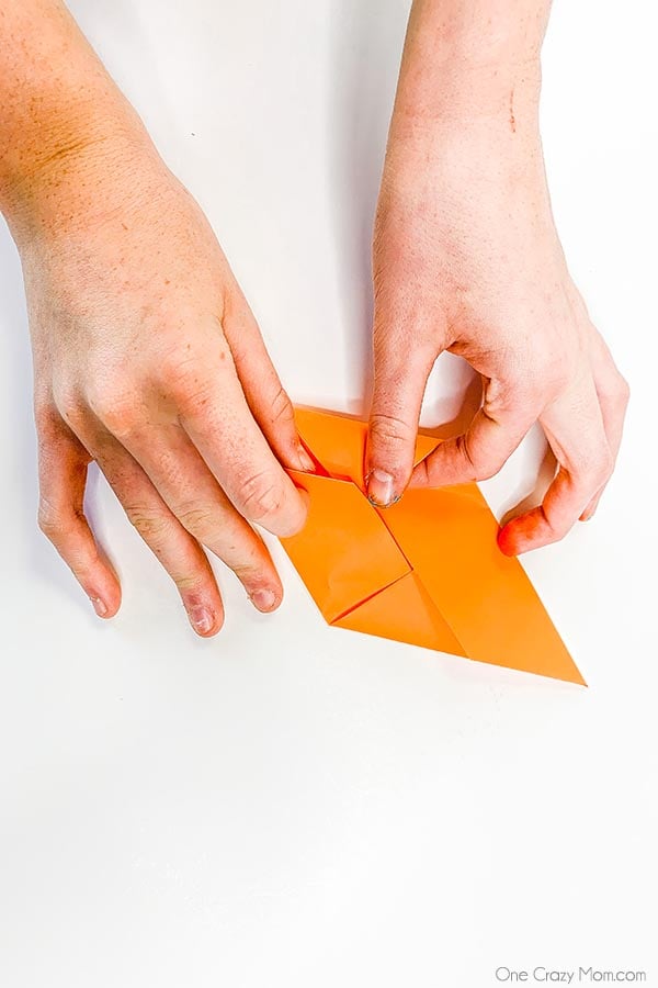 Step by step instructions for making an origami cube. 