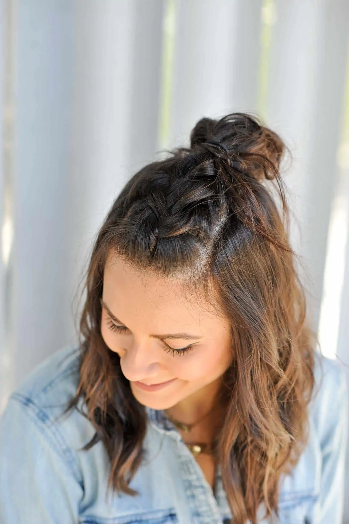 Braided knot style in hair.
