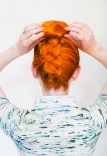 Upside down braid style in hair.