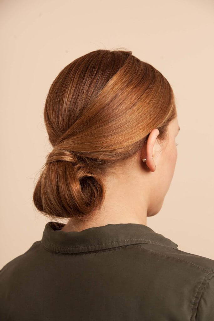Chignon hairstyle on woman.