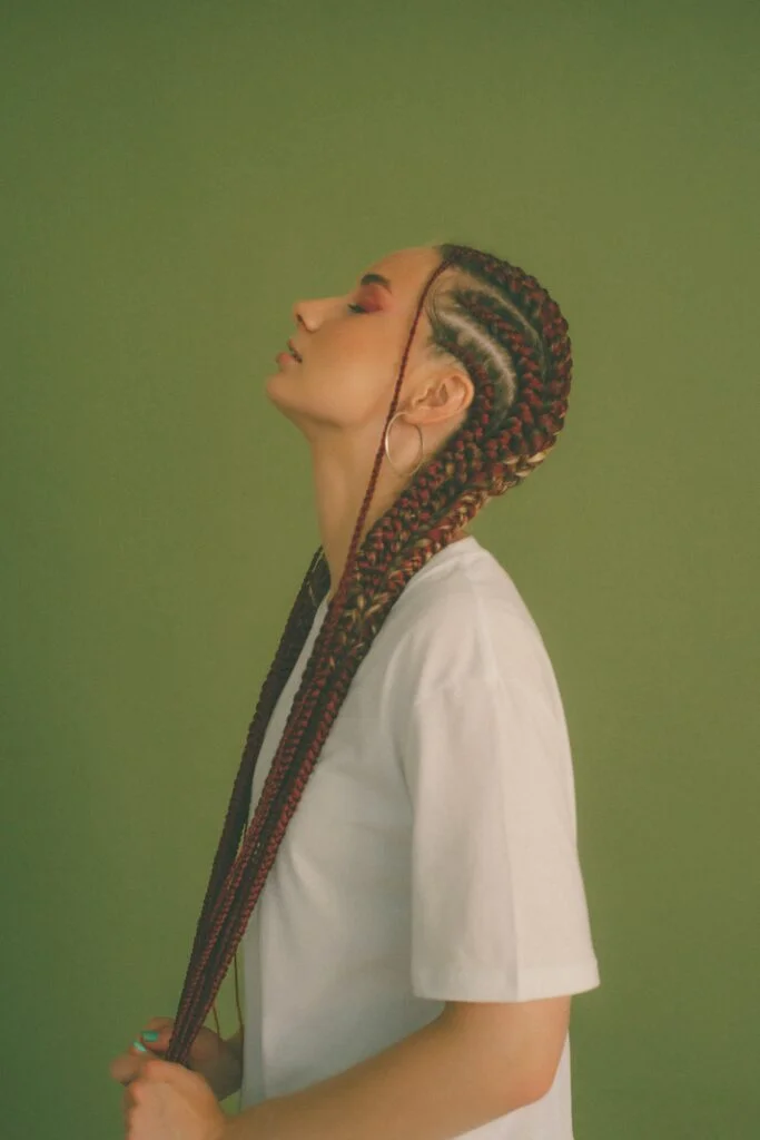 Braided hairstyle on woman.